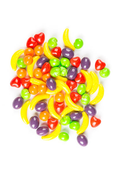 istock Pile of fruit shaped candies isolated on a white background 848297912