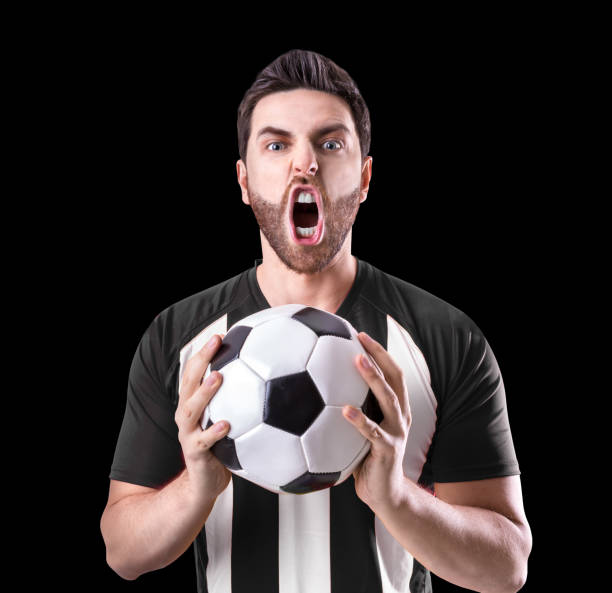 istock Fan / Player celebrating on black and white uniform 848320296