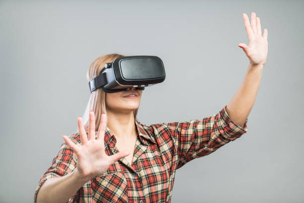 istock Young adult girl with virtual reality set 848321948