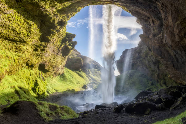istock Kvernufoss Waterfall at Summer with blue sky in Iceland 848342356