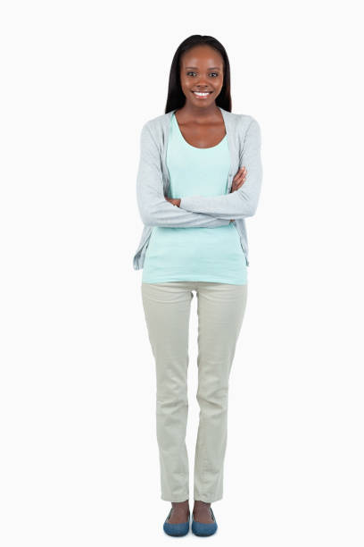 istock Smiling young woman with arms folded 848349308