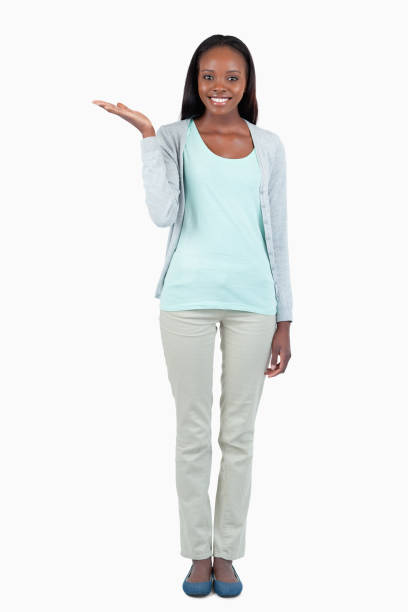 istock Smiling young woman holding her palm upwards 848384500