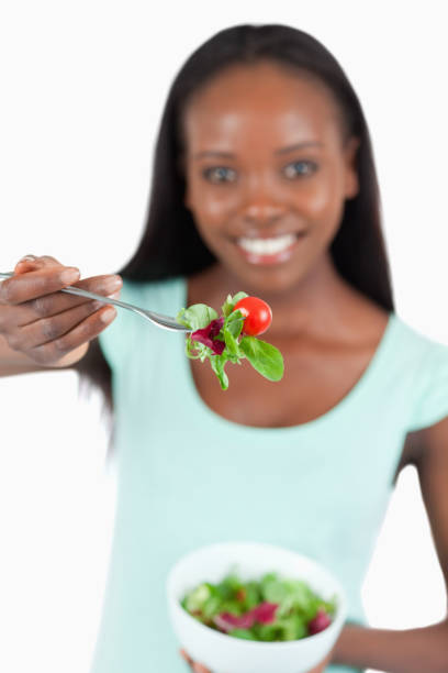 istock Salad offered by happy smiling woman 848386852