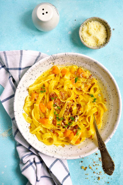 istock Tagliatelle with pumpkin in a cream sauce 848387948
