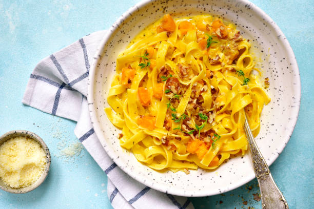 istock Tagliatelle with pumpkin in a cream sauce 848388078