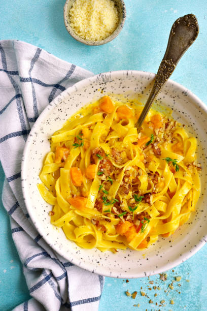 istock Tagliatelle with pumpkin in a cream sauce 848388094