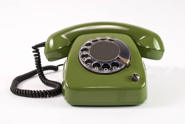 istock Old retro green phone isolated on white background in studio 848397704