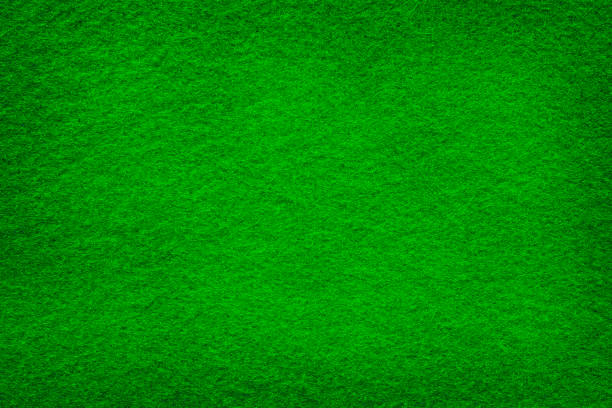 istock Green felt grunge surface extremal close up. 848402134
