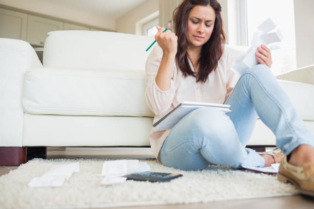 istock Young woman getting stressed over bills 848417986