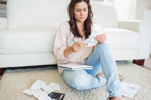 istock Woman looking at the bills 848418052