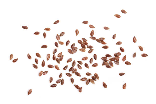 istock flax seeds isolated on white background. Top view 848427652
