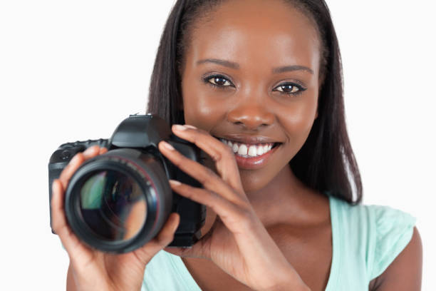 istock Smiling young photographer at work 848436296