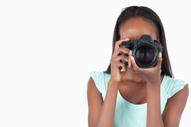 istock Young female photographer at work 848436360