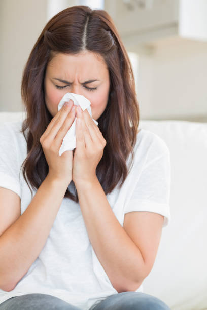 istock Woman blowing nose 848442214