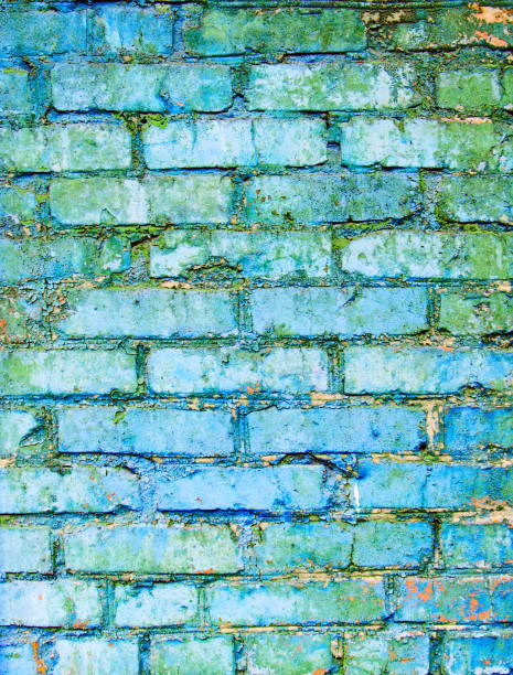 istock Texture of old blue and gray brick wall surface with cement and concrete seams 848452546