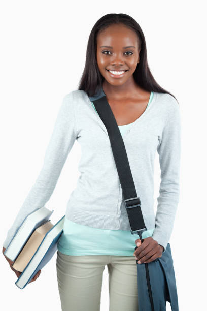 istock Smiling young student with books and bag 848461058