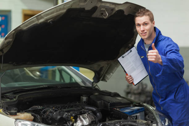 istock Mechanic with clipboard gesturing thumbs up 848481158