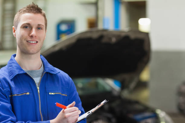istock Happy mechanic with clipboard 848481546