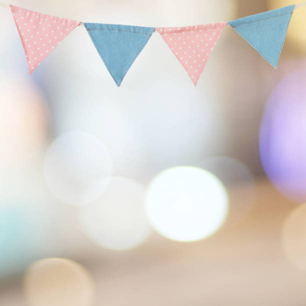 istock Bunting party flag on blur abstract bokeh light background, with copy space for text, holiday concept background 848492632