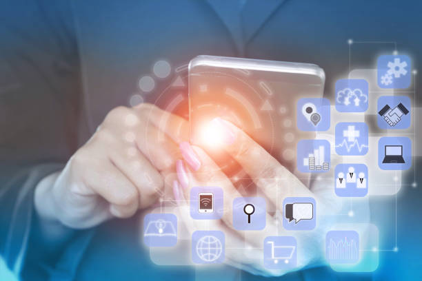 istock woman hand holding smart phone with technology icons and connection 848498242