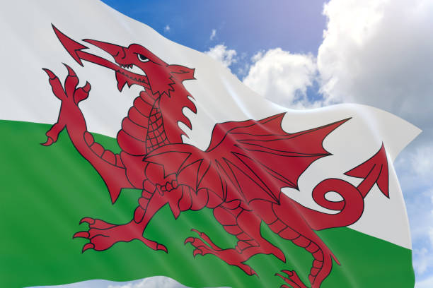 istock 3D rendering of Wales flag waving on blue sky background 848518566