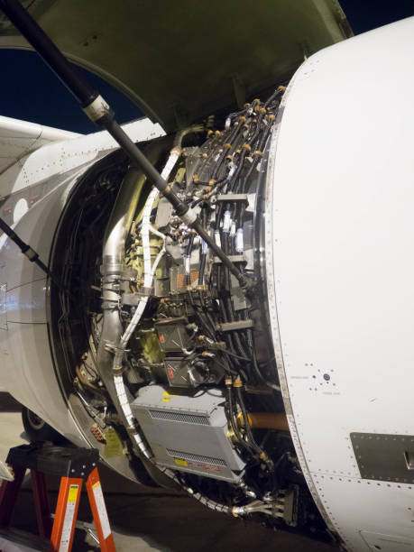 istock Aircraft engine cowling opened showing engine control units, FADEC and other units 848539778