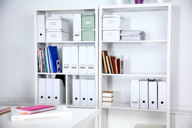 istock Modern office interior with tables, chairs and bookcases 848540278