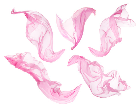 Paño de la tela que fluye en el viento, vuelo sopladora rosa seda, blanco aislado photo