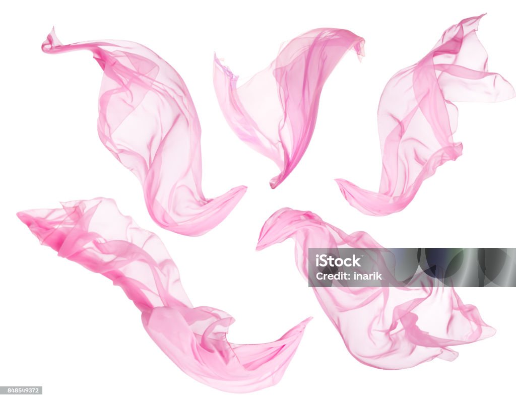 Tissu chiffon qui coule sur l’énergie éolienne, battant soufflage soie rose, blanc isolé - Photo de En matière textile libre de droits