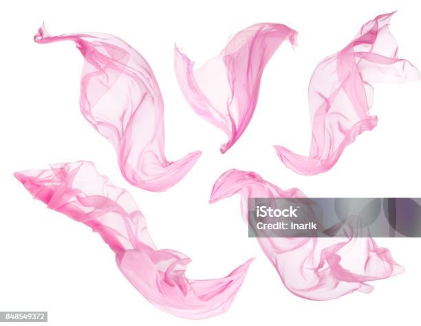 Fabric Cloth Flowing On Wind Flying Blowing Pink Silk White Isolated Stock Photo - Download Image Now