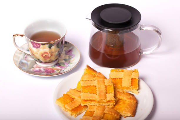 istock Crostata with apricot jam and a cup of tea. 848558298