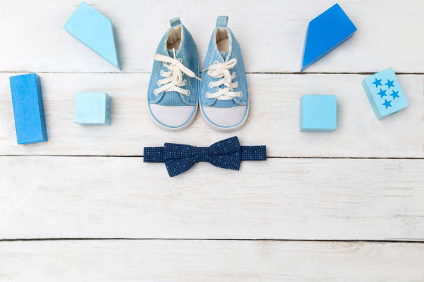 istock Blue sneakers and a bow tie for a boy. View from above 848564094