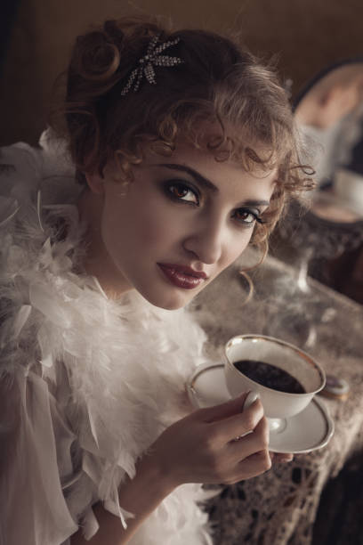 istock Retro woman drinking hot coffee 848564462