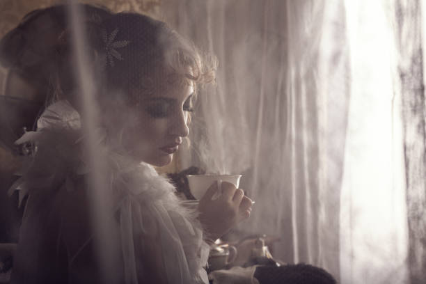 istock Retro woman drinking hot coffee 848564752