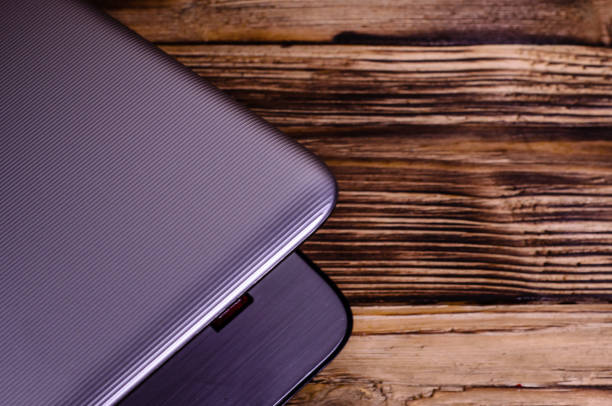 istock Laptop on wooden table 848580944