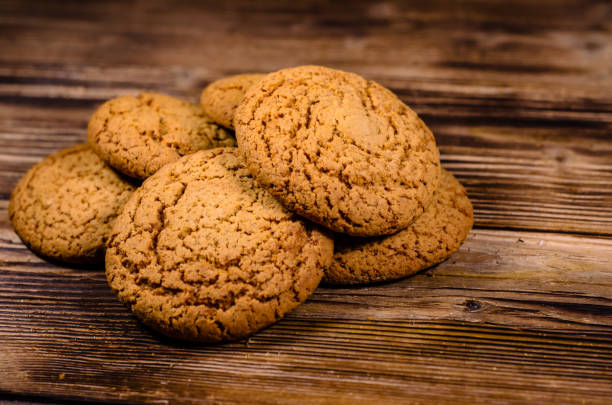 istock Stack of the oatmeal cookies on wooden table 848581016
