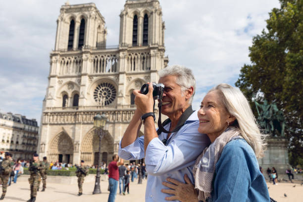 Happy seniors in Paris, having a wonderful vacation