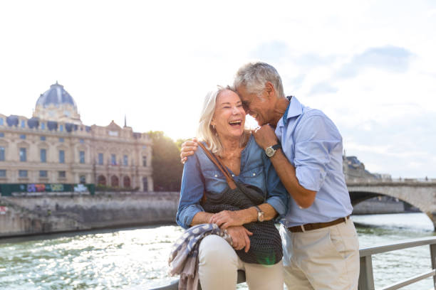 istock Seniors taking a break in Paris relaxing on the Seine River 848588328