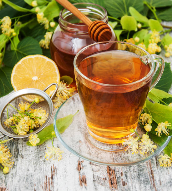istock cup of herbal tea with linden flowers 848588656