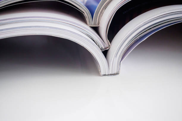 istock pile of magazines stack on white table in living room 848592426