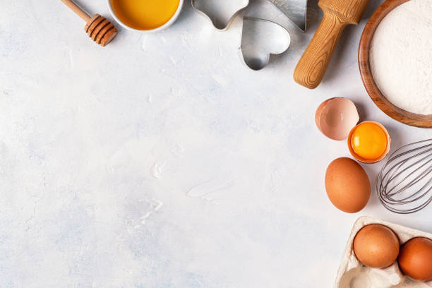 istock Ingredients for baking  - flour, wooden spoon, rolling pin, eggs. 848595552