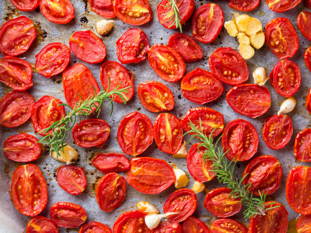 istock Red heirloom tomatoes baked with garlic 848598786