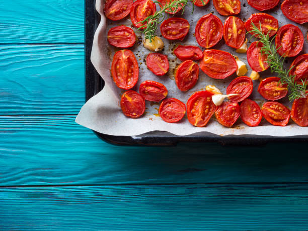 istock Red heirloom tomatoes baked with garlic 848598860