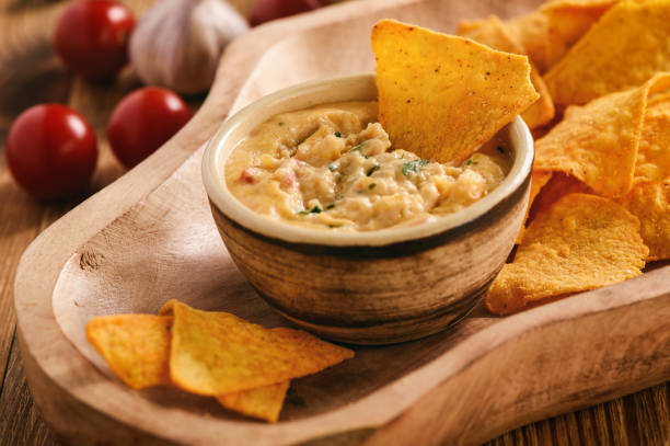 istock Mexican cheese dip served with nachos. 848599306