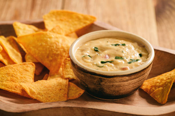istock Mexican cheese dip served with nachos. 848599314