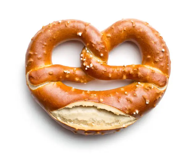 baked pretzel on white background