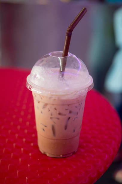 istock Ice coffee mocha on red table in coffee shop 848616100