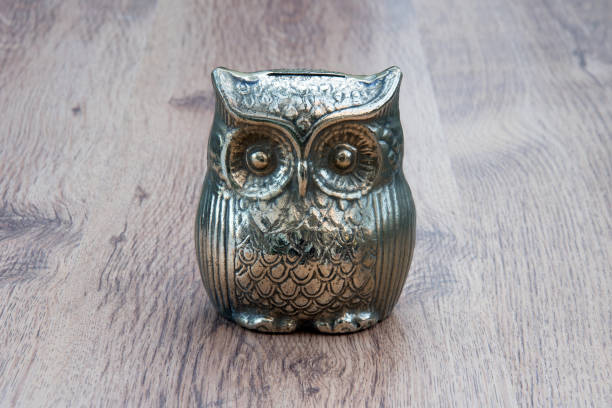 istock Owl piggy bank money box 848627308