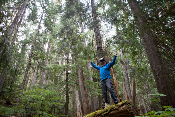 istock Young male enjoys some virtual reality outdoors 848653954