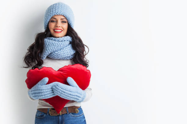 istock Woman in hat holding heart 848654210